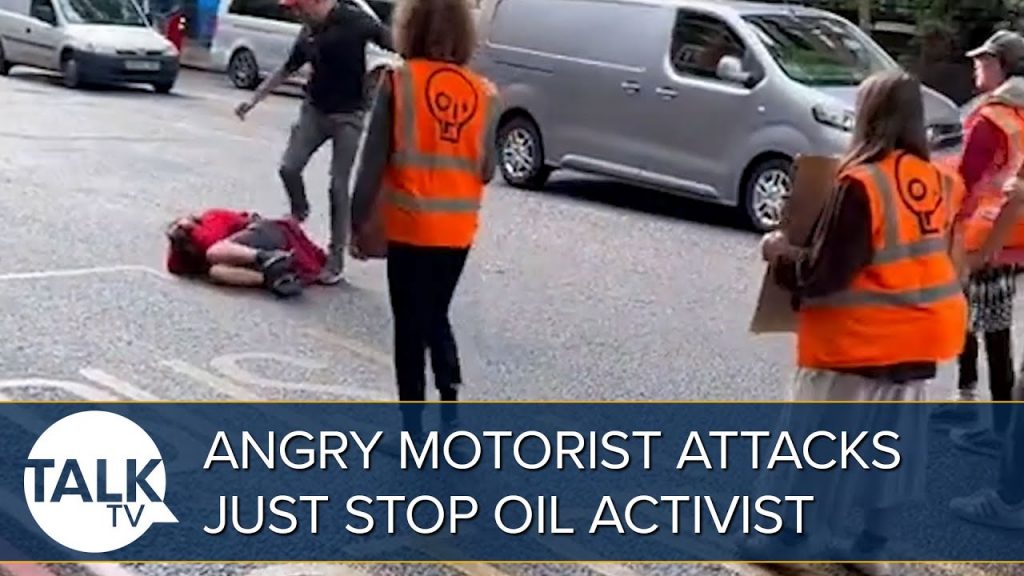 Furious motorist PUNCHES and KICKS Just Stop Oil protester